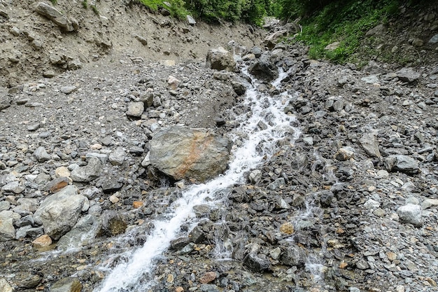 Waterfall in the gorge of the Cherek River in the vicinity of the Ushtulu tract Caucasus June 2021