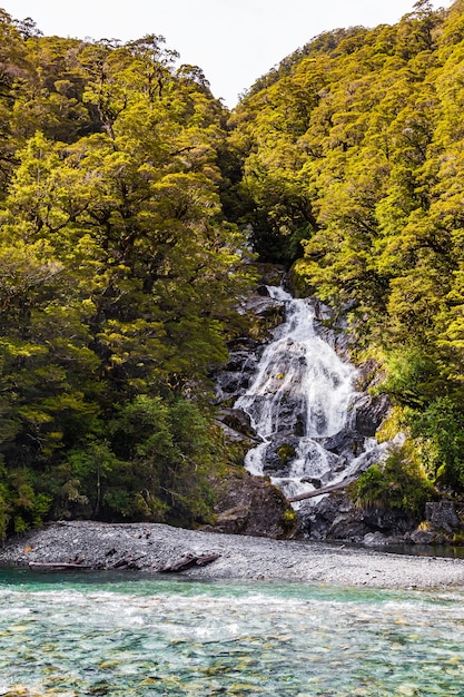 A waterfall among the greenery on the South Island New Zealand