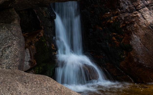 A waterfall in the mountains Water fell slowly