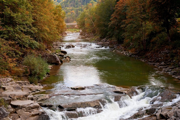 Waterfall Probiy in Yaremche and mountain view river Prut Autumn landscape Carpathians Ukraine Selective soft focus