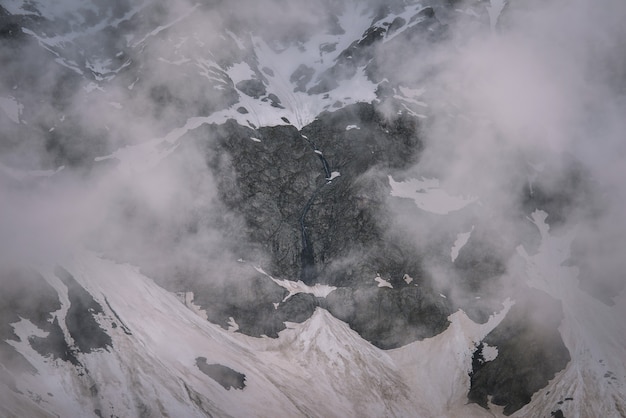 Waterfall In The Snowy And Rocky Mountains