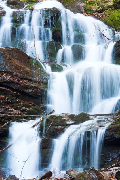 Waterfalls on Rocky Stream, Running Through Autumn Mountain Forest