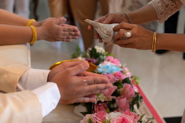 Watering The Conch The Bride And Groom Stock Photos And Images