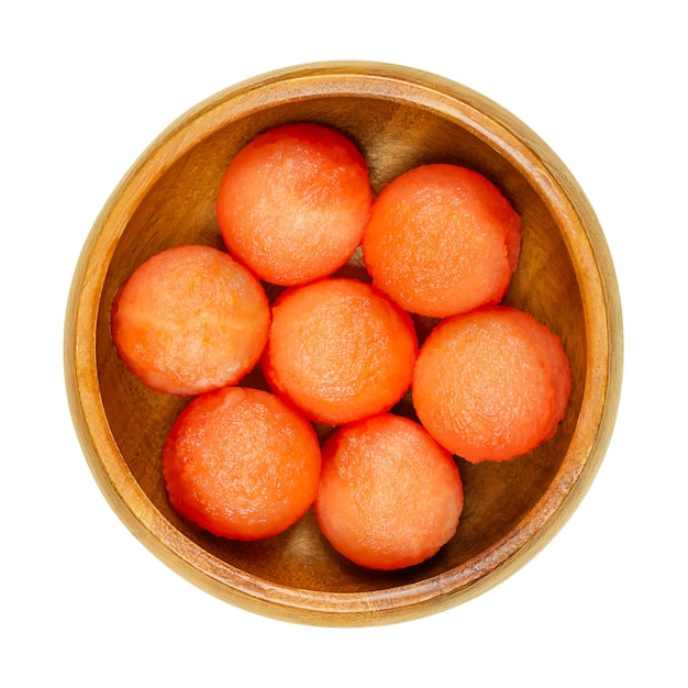 Watermelon balls in a wooden bowl