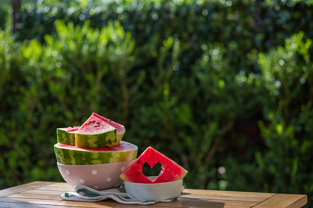 Watermelon berry Summer berry Watermelon backgroundJuicy red watermelon with carved heart Summer