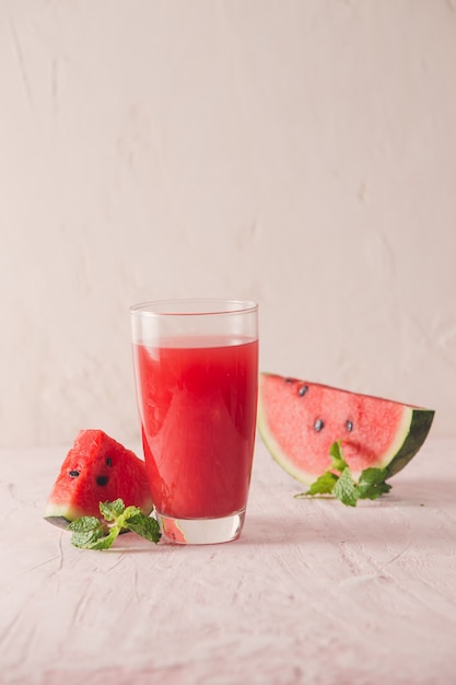 Watermelon drink in glasses with slices of watermelon