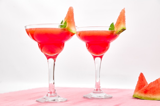 Watermelon margarita cocktail on white