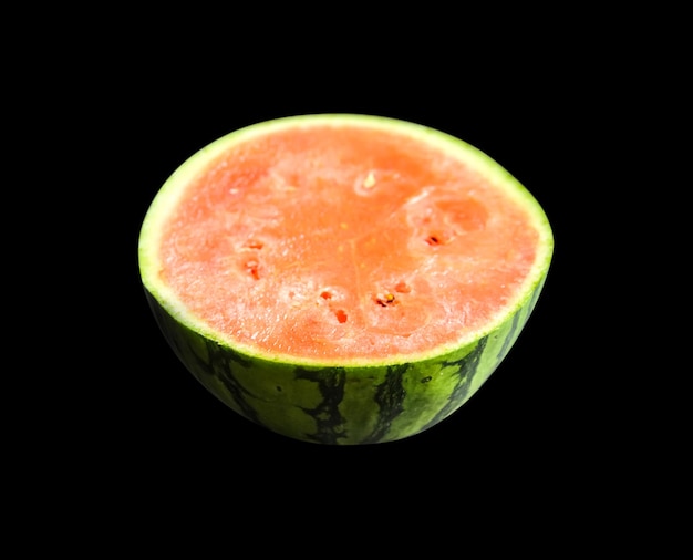 Watermelon slice isolated on black background