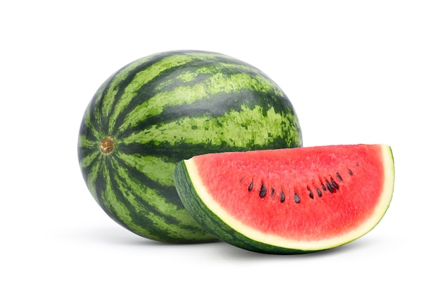 Watermelon with slice on white surface