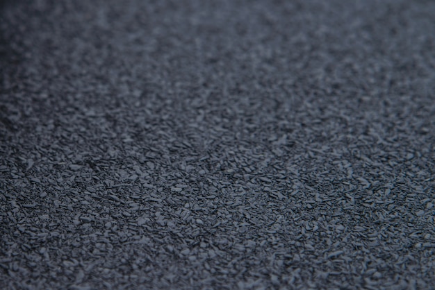 Waterproof bitumen insulation material background texture, closeup