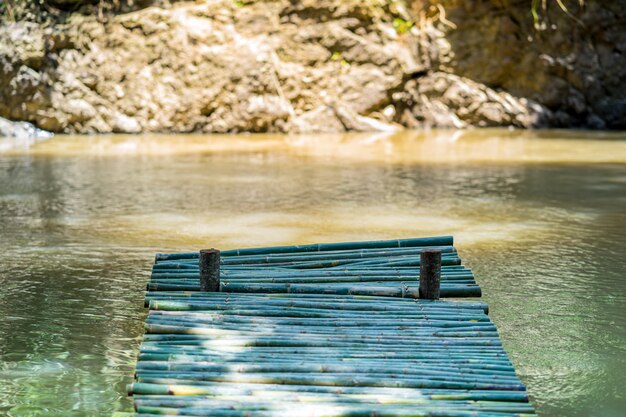 Waterside, wood pier made of bamboo in the brook