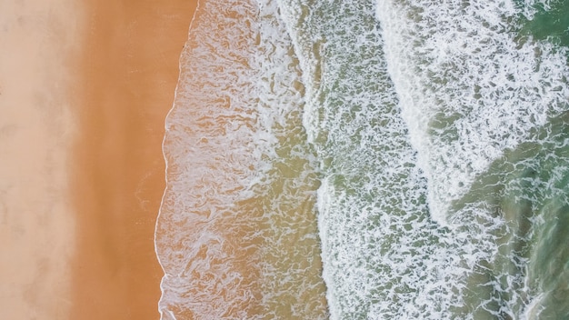 Wave of the sea on the sand beach