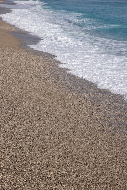 Waves on the beach after rain