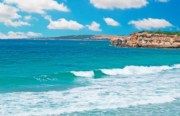 Waves by Sardinia rocky shore