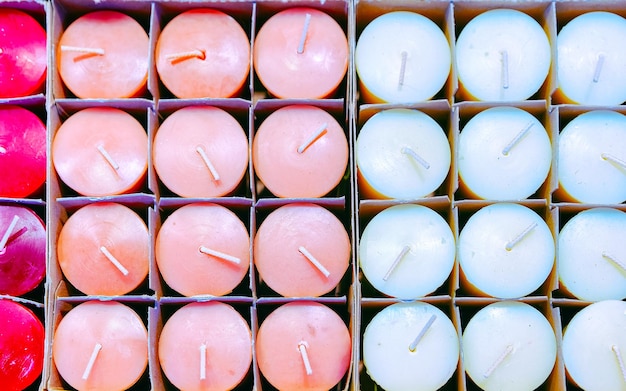 Wax candles at Christmas Market at Gendarmenmarkt square in Winter Berlin, Germany. Advent Fair Decoration and Stalls with Crafts Items on the Bazaar. German street Xmas and holiday in European city