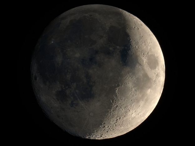 Waxing crescent moon seen with telescope