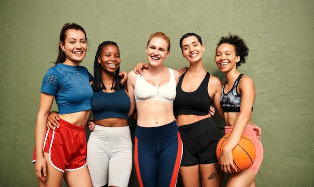 We are the definition of team spirit Cropped shot of a diverse group of sportswomen standing together after a basketball game during the day