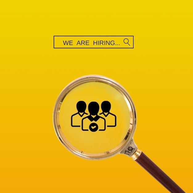 We are Hiring a design with a Magnifying Glass on a yellow background Minimal we are hiring