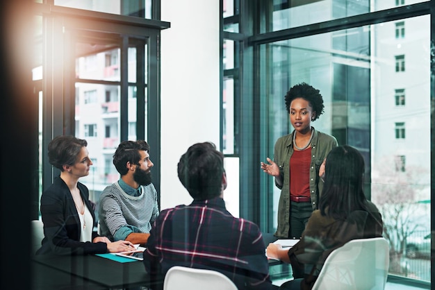 We have plenty of resources to utilise on this project Shot of a businesswoman giving a presentation to her colleagues in an office