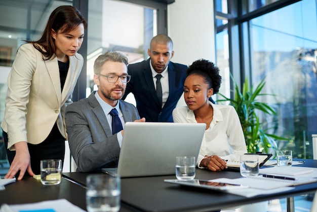 We have so much potential to improve our profits Cropped shot of a group of business colleagues meeting in the boardroom