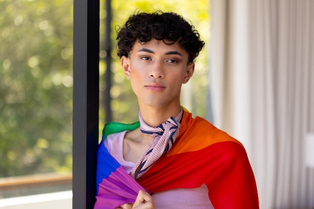 Photo wearing pride flag transgender transgender woman standing confidently in living room