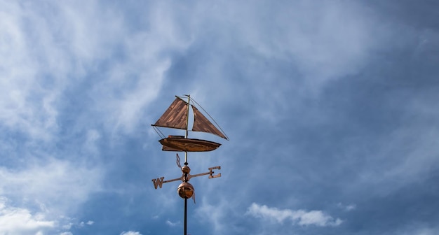 Photo weather vane and blue sky