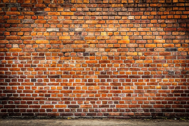 Photo weathered brick wall with grungy appearance