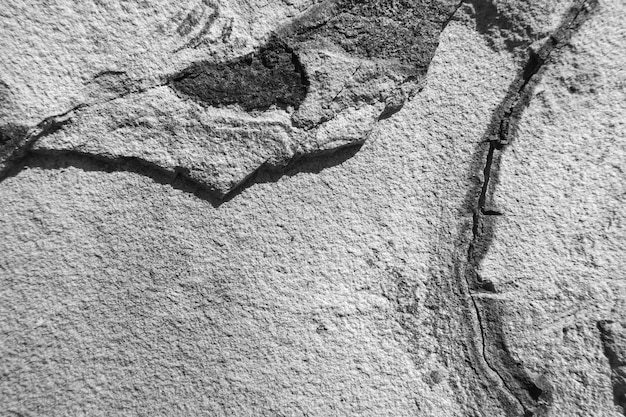 Weathered stone background Black and white rock surface texture