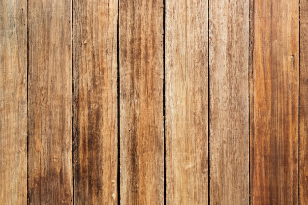 Photo weathered wooden wall with vertical planks displaying natural wood grain and texture