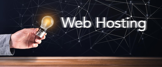 Web hosting and light bulb in hand