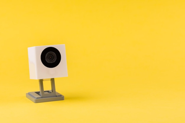 Photo webcam white on a yellow background object internet technology concept