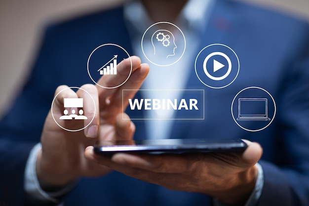 Webinar icon with man holding a tablet