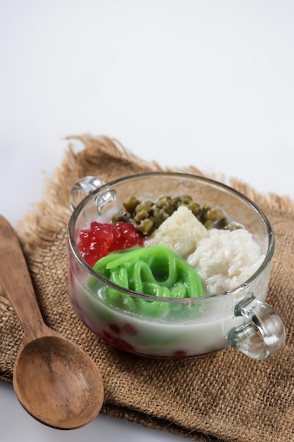 Wedang Angsle is Javanese warm dessert made of rice noodle, sago pearls in ginger coconut milk soup.