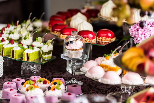 Wedding or birthday tasty decorations. Candy bar. Sweet table