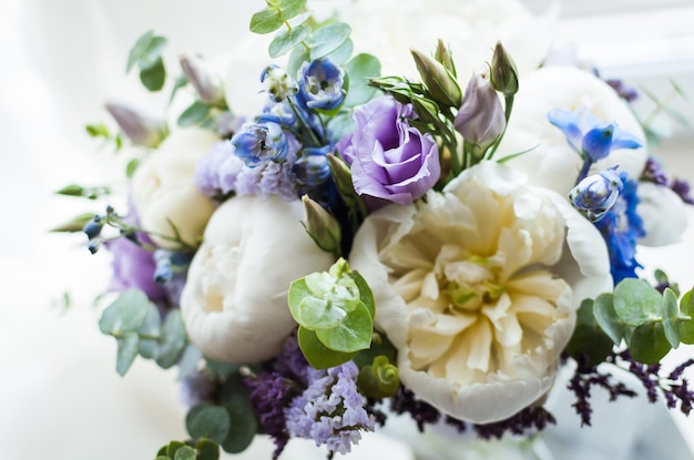 Wedding bouquet of flowers on a white background