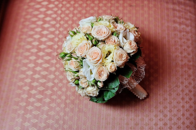 Wedding bouquet on sofa