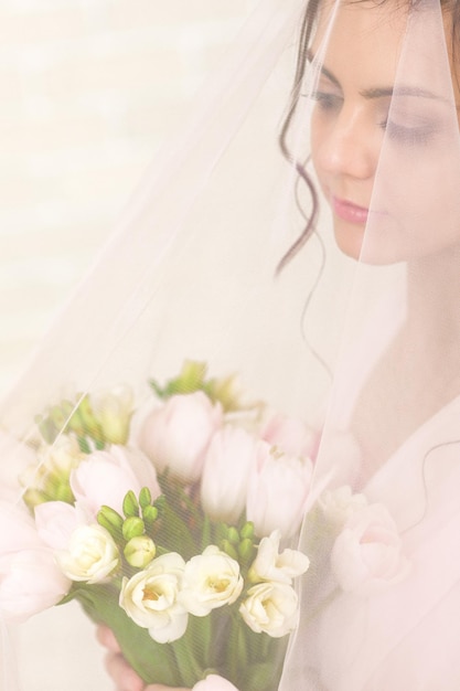 Wedding bouquet of tulips in bride's hands