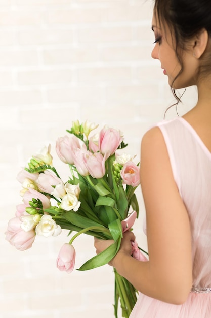 Wedding bouquet of tulips in bride's hands