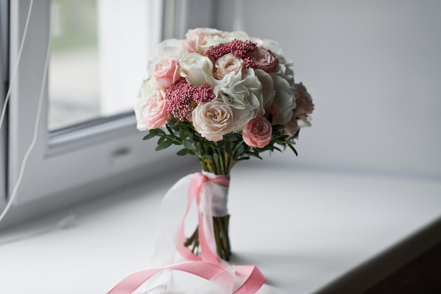 Wedding bouquet on the windowsill 3134