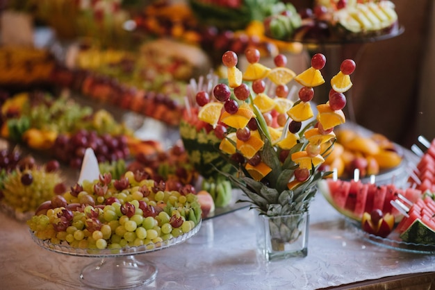 Wedding buffet table with different variety of fresh fruits