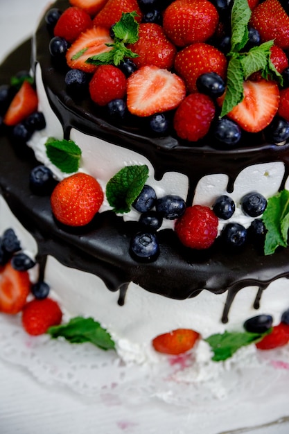 Wedding cake with strawberries chocolate and blueberries