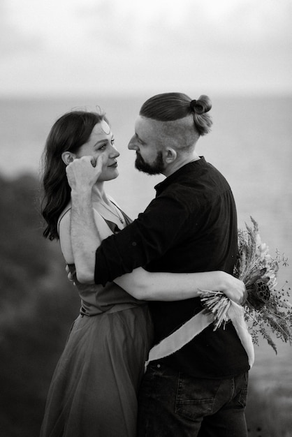 Wedding ceremony of a girl and a guy on high hills