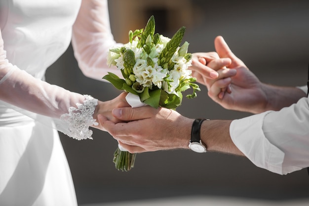 Wedding couple holding hands. bride and groom