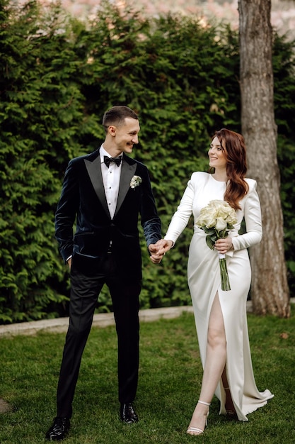 wedding couple portrait, couple dressed in elegant outfit.