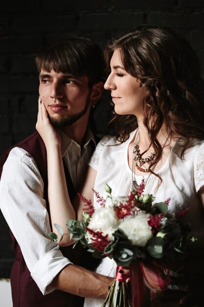 Wedding couple posing in the interior