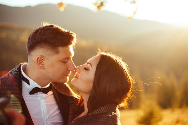 Wedding couple sunset holding hands