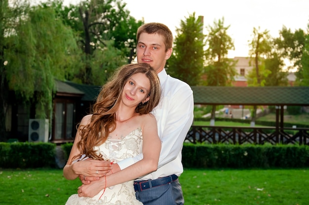 Wedding Day. Happy Couple into the Park. Close-up Portrait.