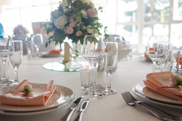 Wedding decor. Flowers in the restaurant, table setting