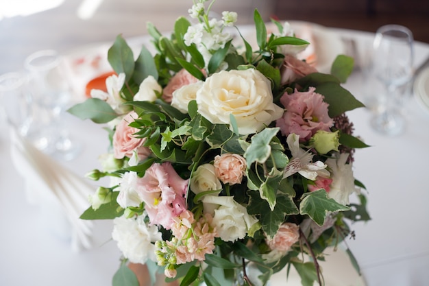 Wedding decor. Flowers in the restaurant, table setting