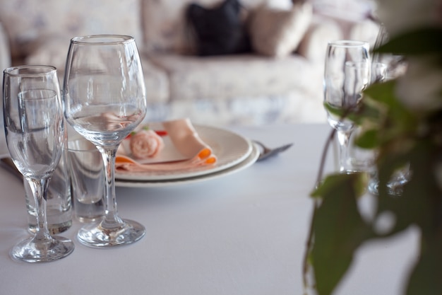 Wedding decor. Flowers in the restaurant, table setting